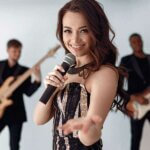 Attractive Young Woman Wedding Singer With Microphone